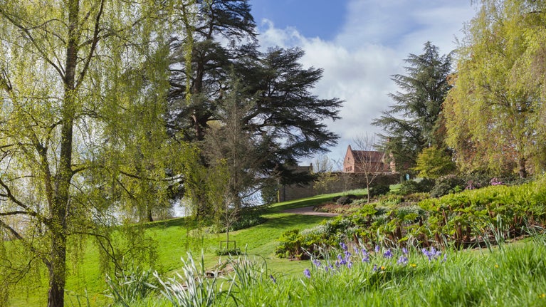 A view towards the house in early spring in the garden at Chartwell, Kent.